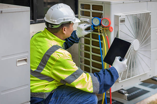 Professional Air Duct Cleaning technician working in California, KY